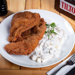 Șnițel vienez (de porc) cu salată de cartofi cu maioneza