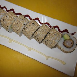 87-Uramaki Dragón Langostino Tempura Aguacate (8 Pzs.)