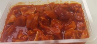 Oreja En Salsa De Tomate