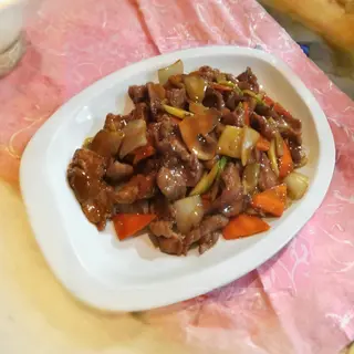 50. Ternera con salsa de ostras