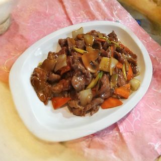 50. Ternera con salsa de ostras