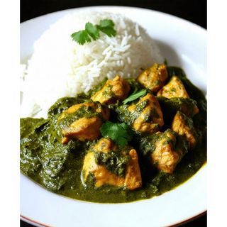 Palak Chicken Served With Rice