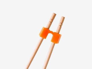 Trzymacz do pałeczek