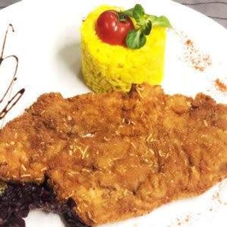 Curcan în crustă de parmezan