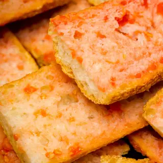 Pan de coca con tomate