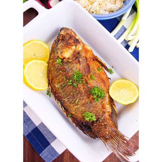 Whole Tilapia Dry or Wet Fried + Rice and Greens