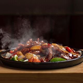 47A. Pato a la plancha / Sizzling duck