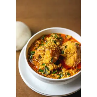 1 plate of Egusi Soup With Swallow And Protein