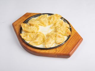 Вареники в сливочном соусе (300 гр.)