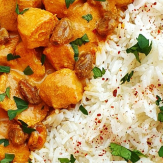 Pollo   En salasa. ( tika masala)