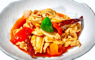 Pollo in salsa piccante