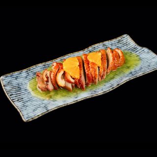 Pato asado con salsa de naranja