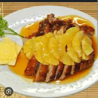 Pato con salsa de piña