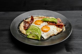 Fried eggs with hummus