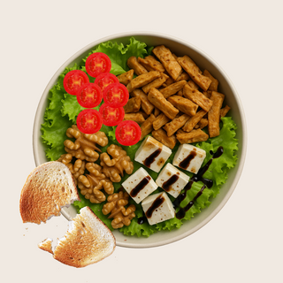 Bowl de Heura, queso griego, nueces, tomate y bálsamo de módena