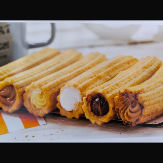 Churros XXL relleno con chocolate blanco e pistachio 