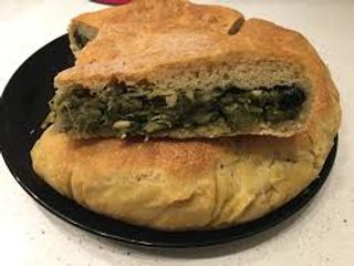Pizza a ruoto ripiena scarola