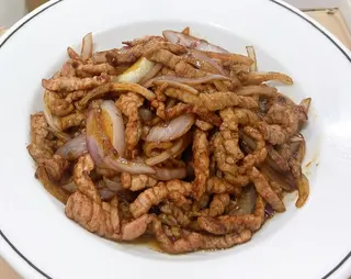 Ternera Con Cebolla