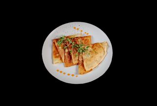 Млинці з куркою та грибами у вершковому соусі