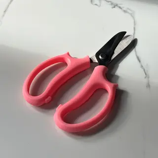 Секатор для квітів рожевий