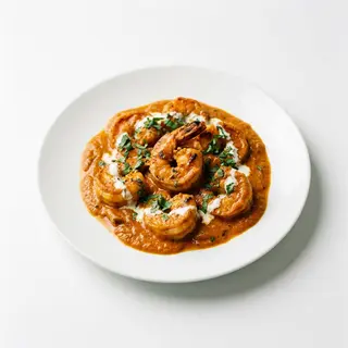 LANGOSTINOS TIKKA MALASA