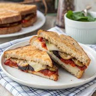 Melanzane e zucchine grigliate, scamorza affumicata, basilico