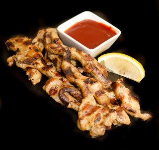 Обезкостени свински гърдички с барбекю сос (350г)