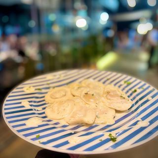 Ravioli de calabaza asada cuatro quesos