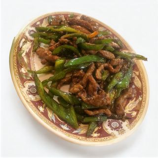 Ternera con pimientos verdes