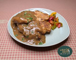 Ceafa porc sos piper verde..