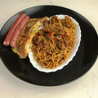 Noodles, Plantain, Egg, Asun and Sausage