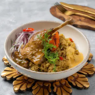 Pato Confitado Con Arroz Meloso
