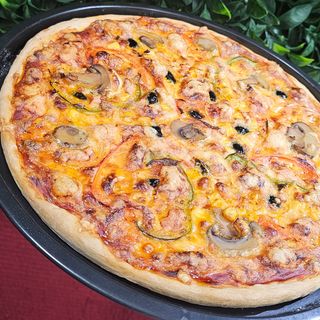 Pizza Vegetariana Media (Imagen ilustrativa)