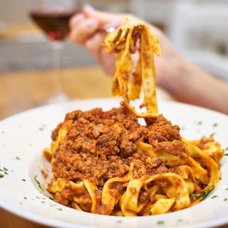FETTUCCINE AL RAGU’ DI CINGHIALE