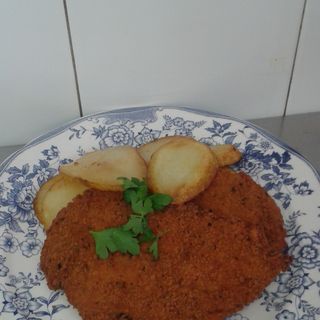 Pechugas empanadas con Patatas fritas caseras.