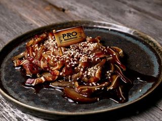 Вуха свинні в соєво-медовому соусі (100g)