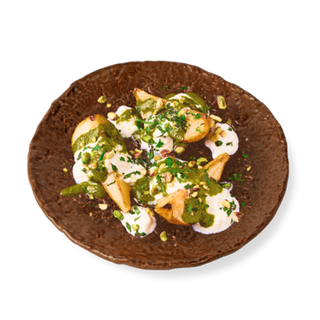 Pera Asada con Stracciatella y Pesto de Pistacho