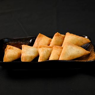 Triángulos de curry frito