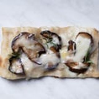 Mezza teglia porcini e lardo