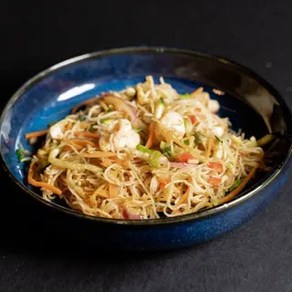 61 Spaghetti di riso con frutti di mare