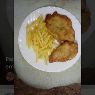 Pechuga rebozada con patatas
