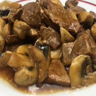 Ternera con champiñones