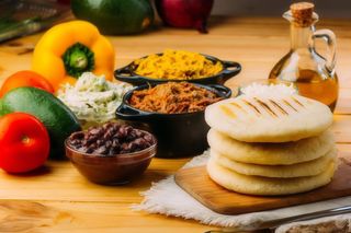 Arepa Con Cochino Fritos Y Queso (Nuevo)