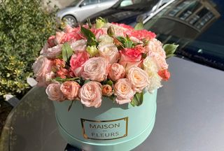 Pink white and cream color spray roses