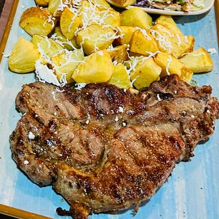 Chuleta de cabeza de cerdo a la brasa