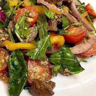 Warm salad with chicken and mushrooms 250gr