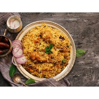 Platter 1: Pilau/Biryani, curry, chapati, fish, samosa, juice.