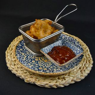 Кусочки куриного филе в панировке