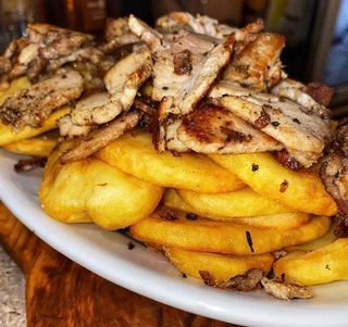 Patate con porchetta