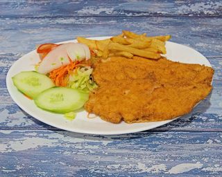 Pechuga de pollo empanado (ración)